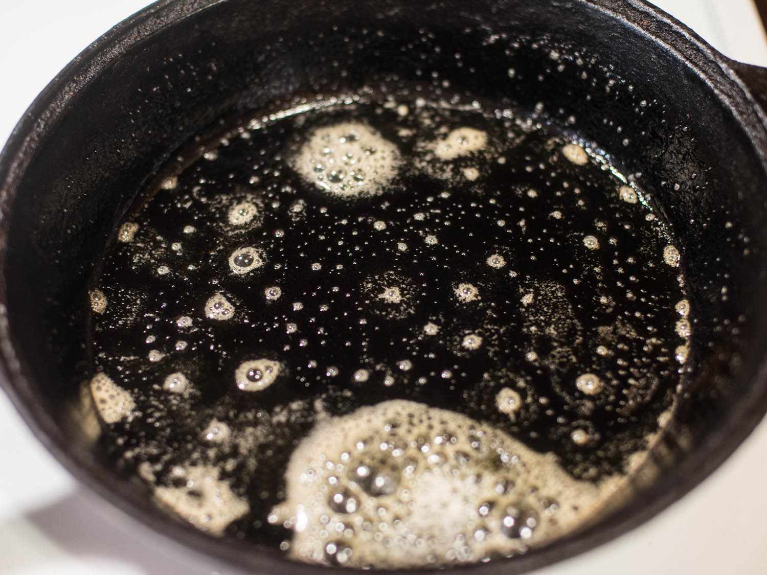 Melting butter in a cast iron skillet to help get a good crust on cornbread.