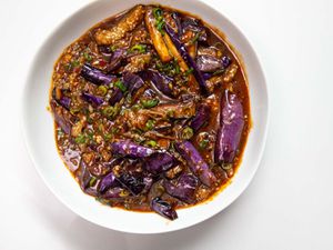 An overhead shot of Sichuan fish-fragrant braised eggplants.