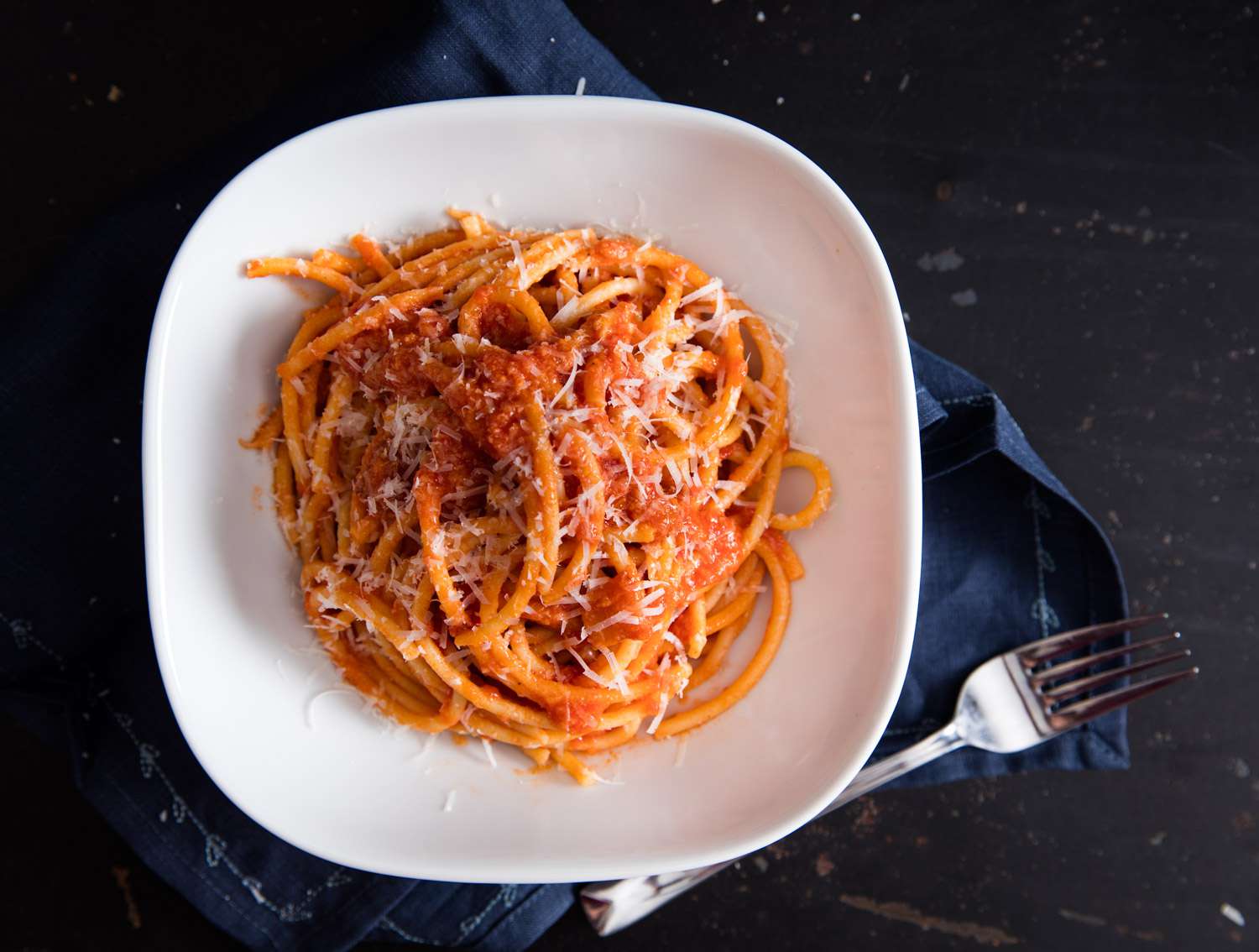 Overhead shot of a bowl of bucatini all'amatriciana.