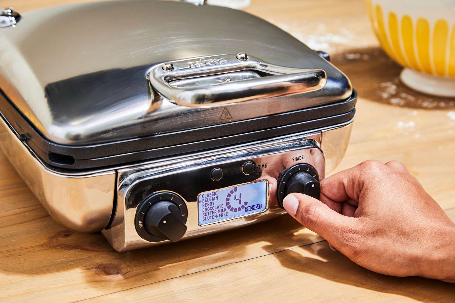 A waffle maker's digital display in use.