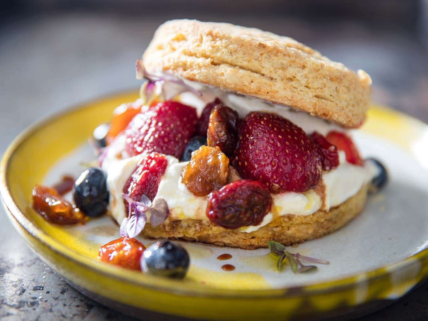 Roasted cherry tomatoes on a biscuit with fruit and whipped cream, option 2