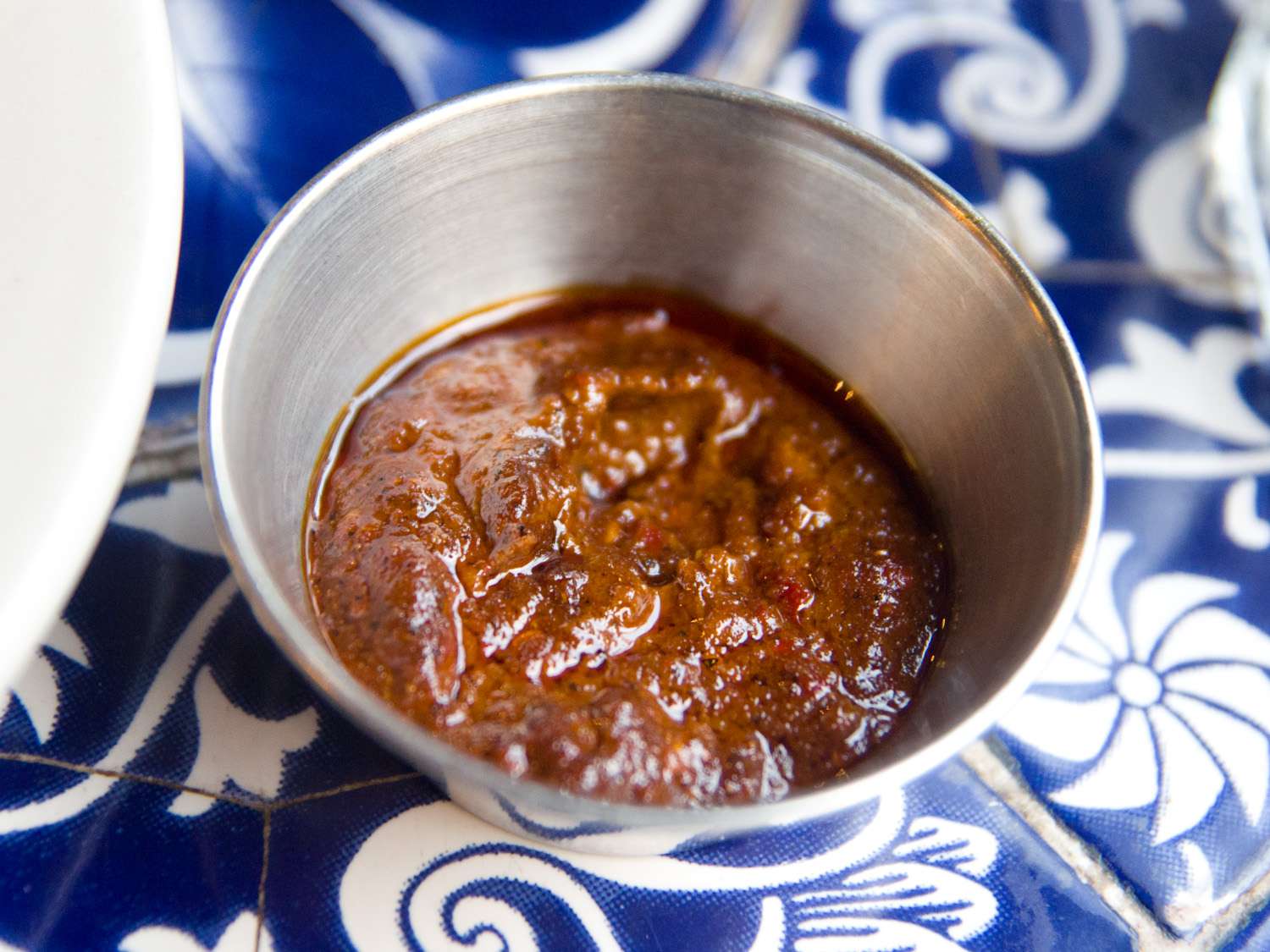 A small dish of harissa sauce. 