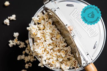 an overhead shot of a Whirley Pop filled with popcorn