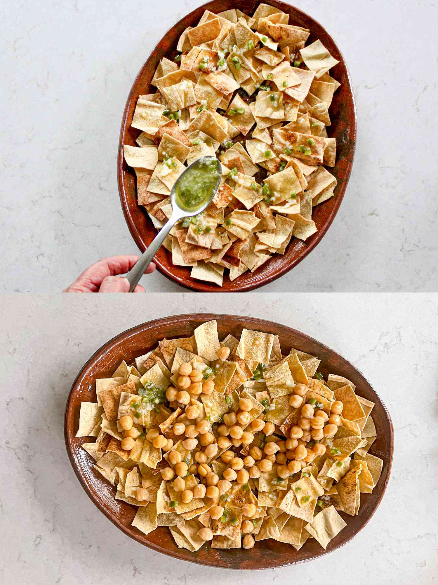 Overhead view of layering dressing and chickpeas