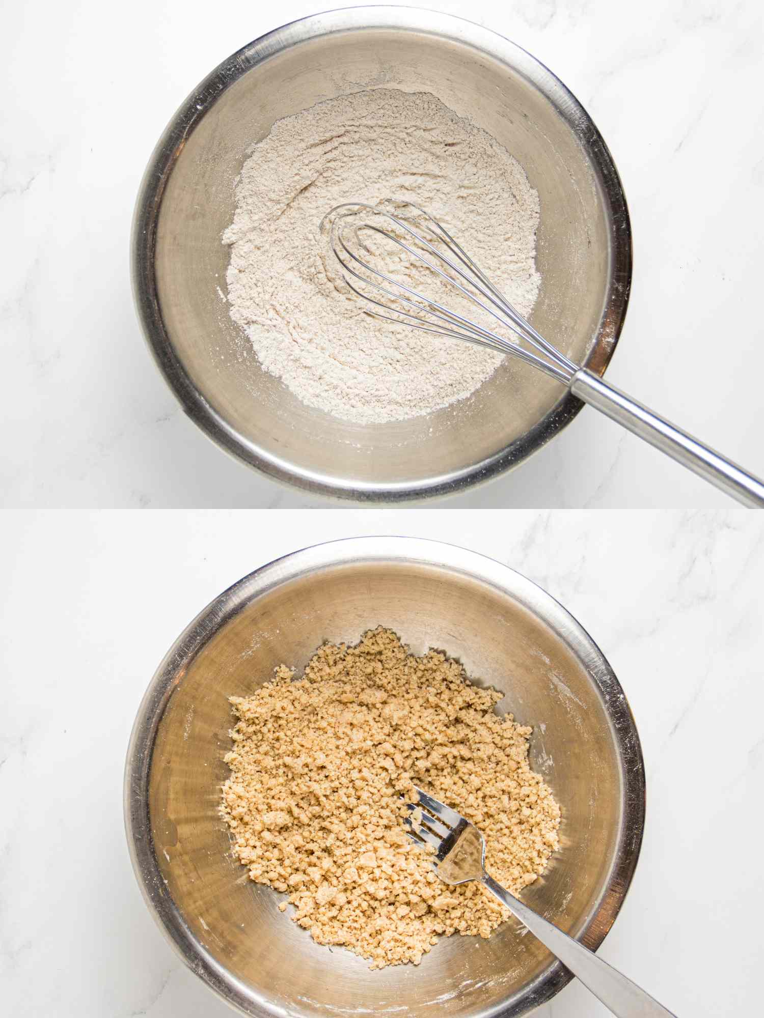 Two mixing bowls one with flour and the other with a crumb mixture both containing whisks