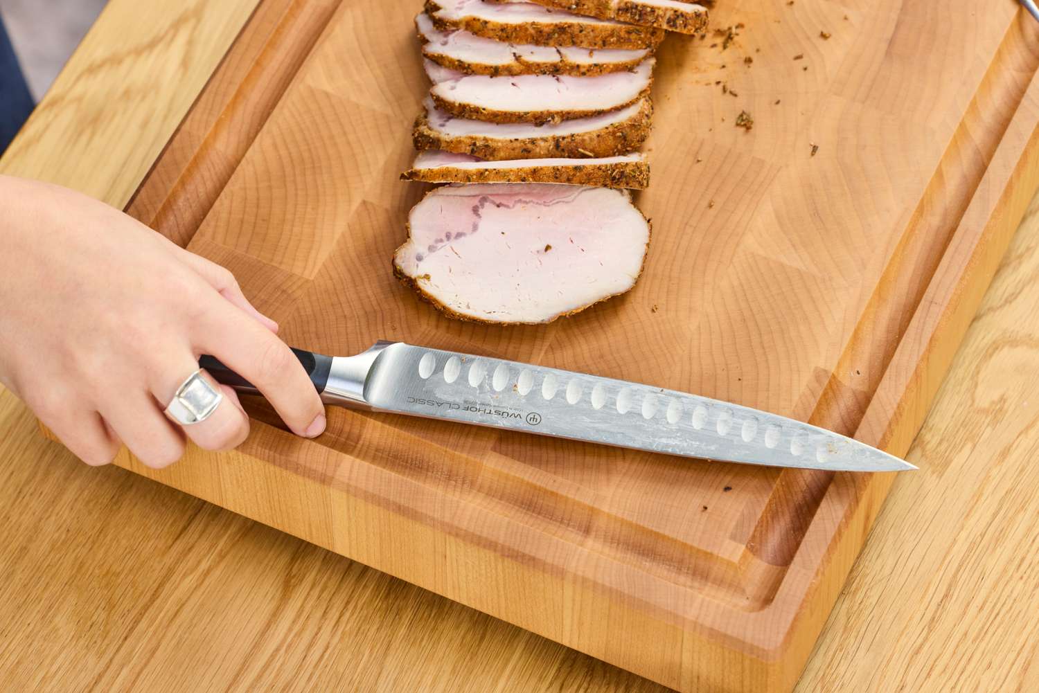 The Wüsthof Classic Carving Set rests on a cutting board