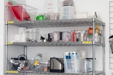 a close up of a metro rack shelving unit filled with kitchen equipment from the Serious Eats test kitchen