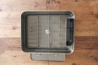 Top view of the Simplehuman Standard Steel Frame Dish Rack on a wood surface