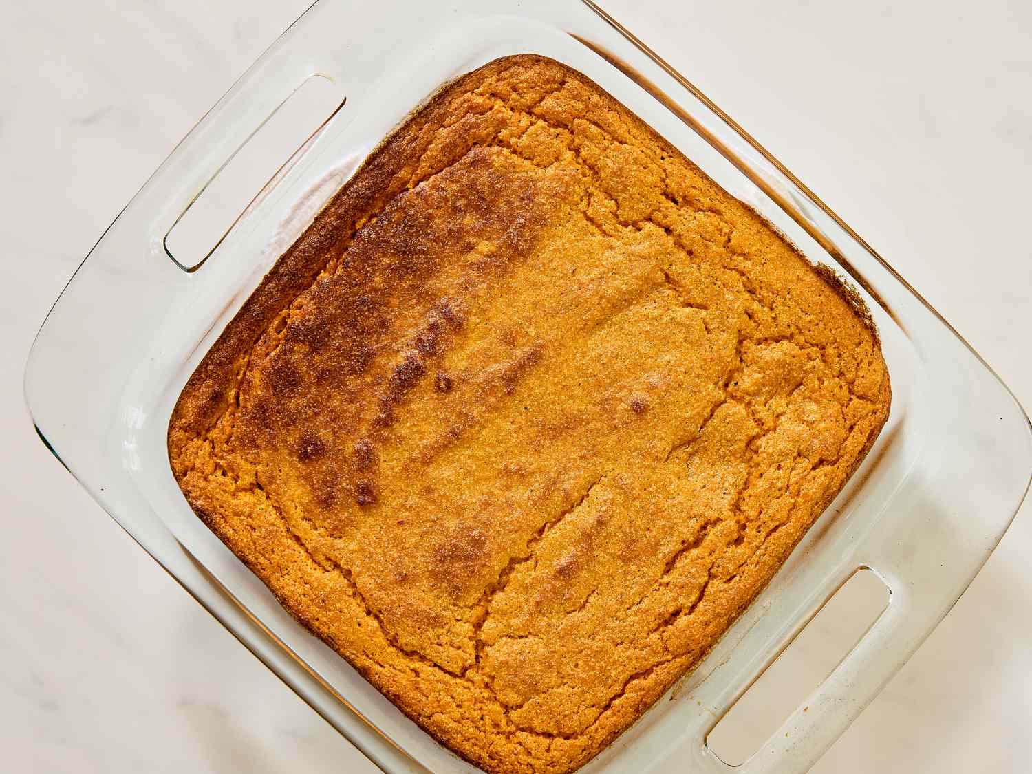 baked squash soufle in in glass baking dish 