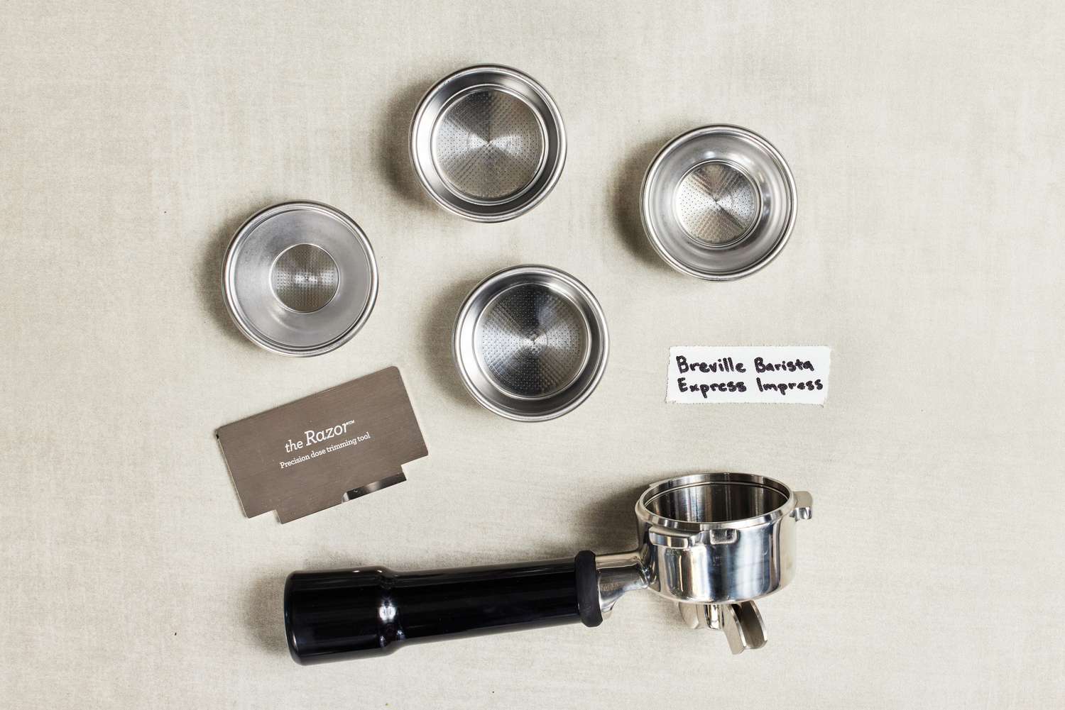 Close up of different parts of the Breville Barista Express Impress