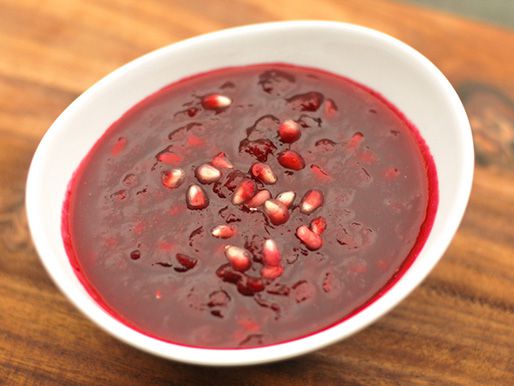 Cranberry-pomegranate sauce, served in a white bowl.