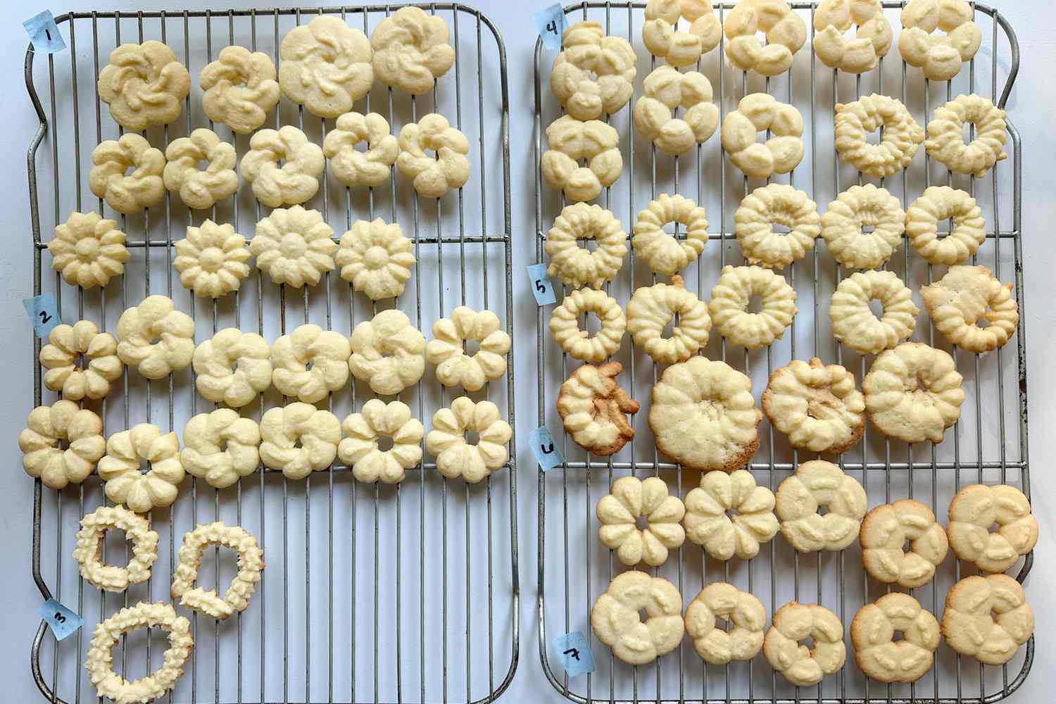 Two cooling racks filled with cookies