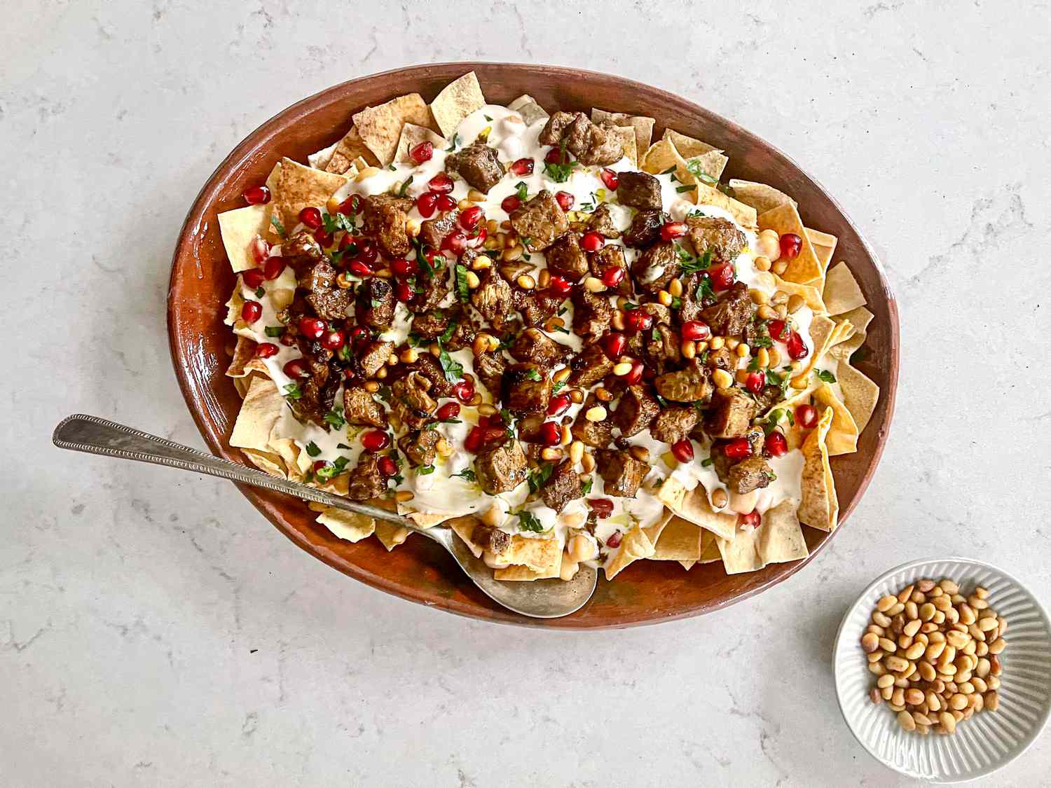 Overhead view of finished hummus fatteh