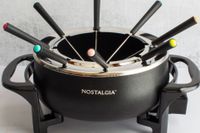 The Nostalgia fondue pot and its color-coded forks.
