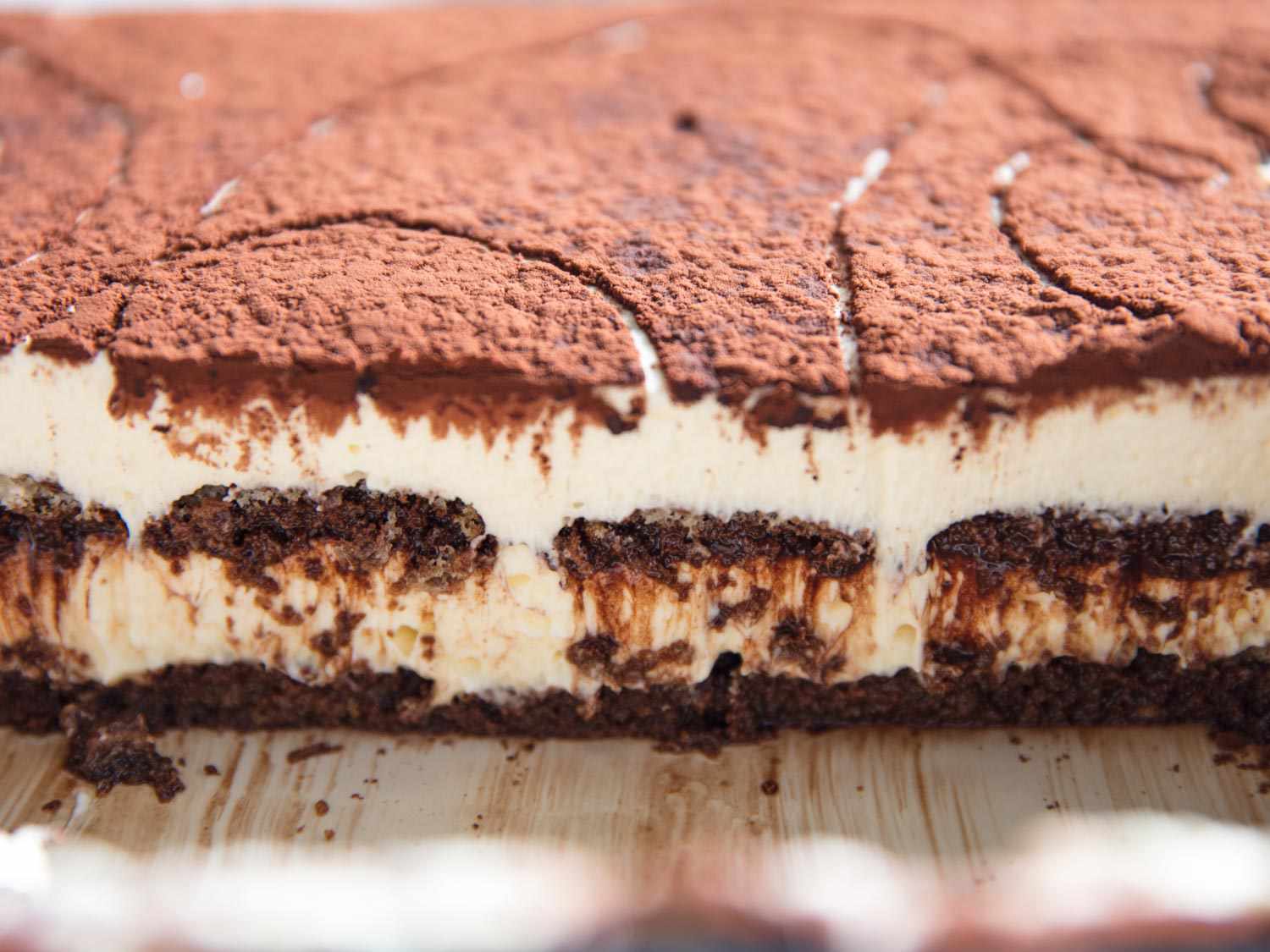 A profile of a creamy tiramisu, showing the layers.