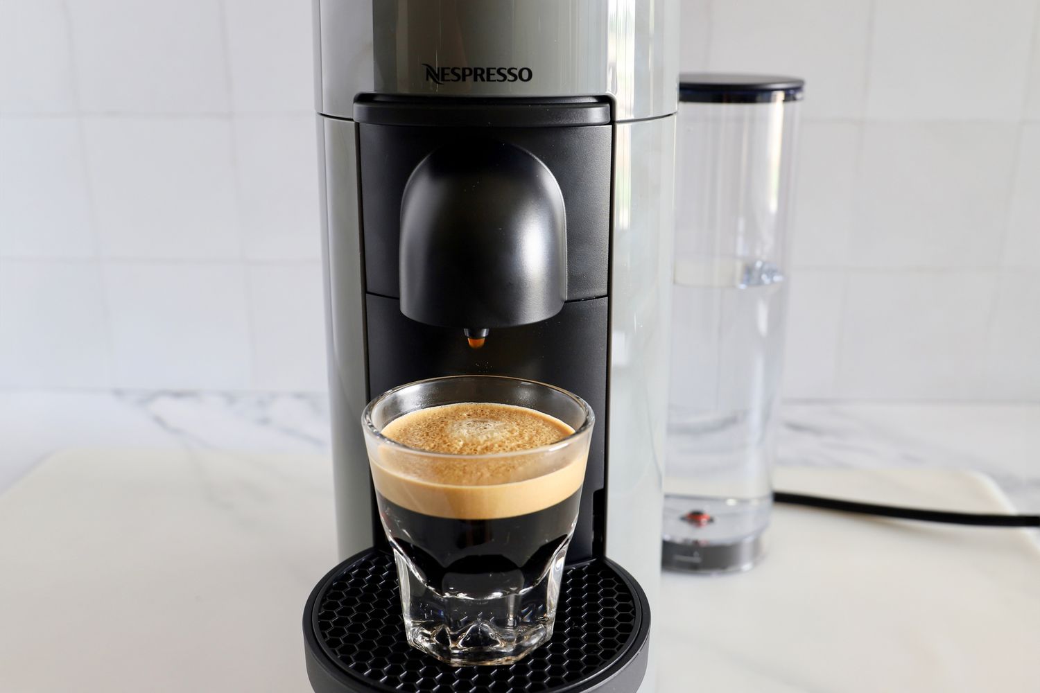 A cup of espresso on a Nespresso VertuoPlus Coffee and Espresso Machine by De'Longhi