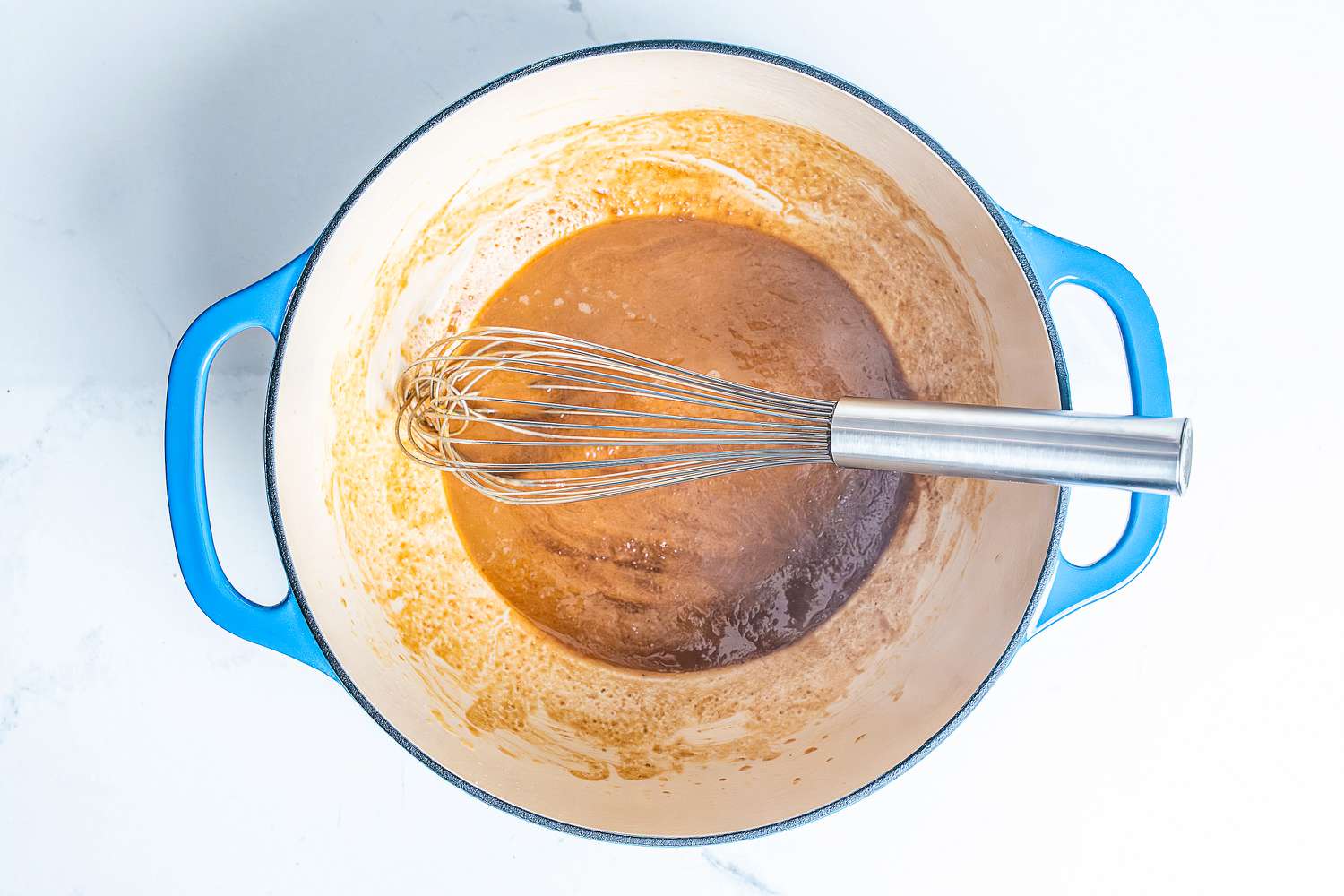 Winco Stainless Steel Piano Wire Whip in a pot