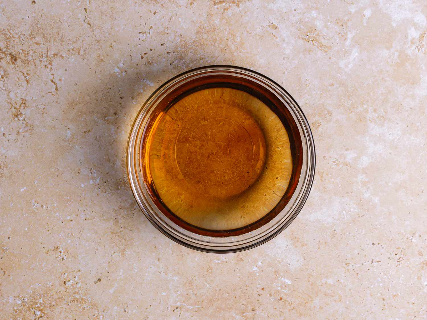 Vanilla mixed with water in a small glass bow