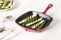 Cooked zucchinis in the Cuisinart Chef's Classic 9.25-inch Square Grill Pan on a white counter 