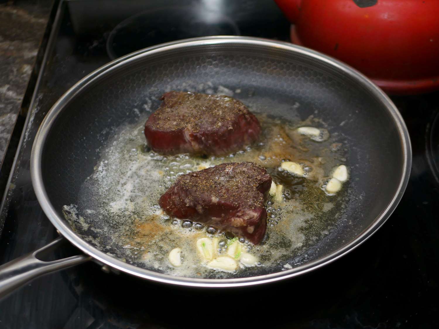 searing steak in Hexclad pan 