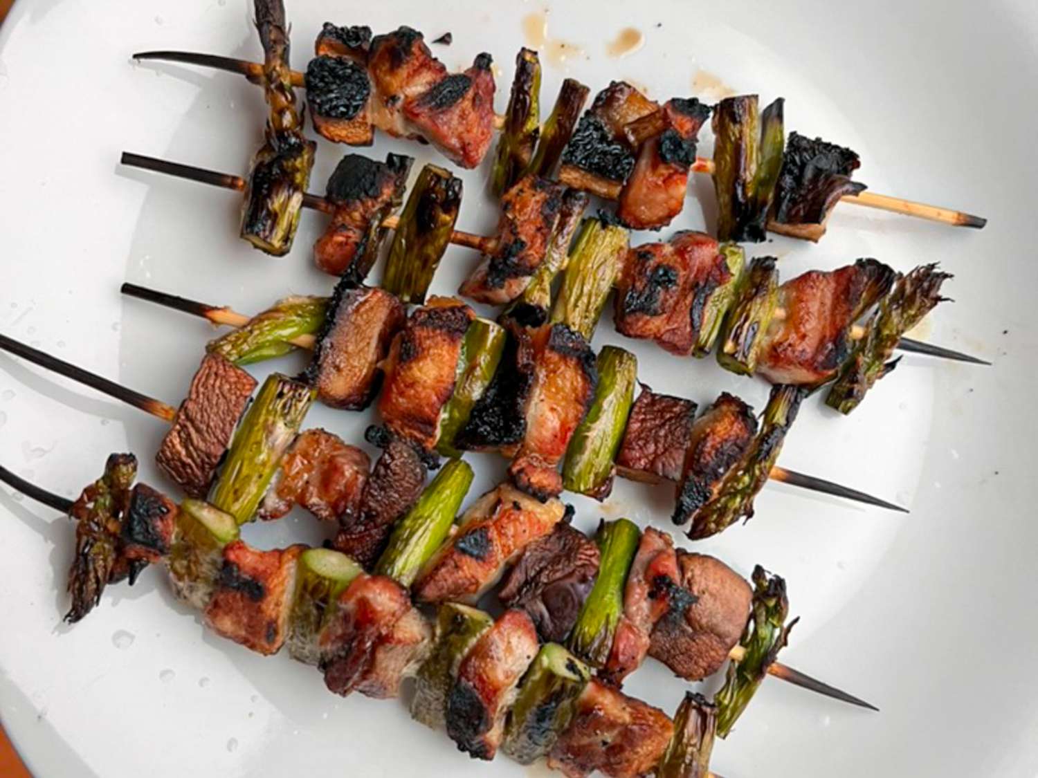 Yakitori-skewered meat and asparagus.
