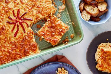 A dish of arroz imperial served with garnishes and side dishes