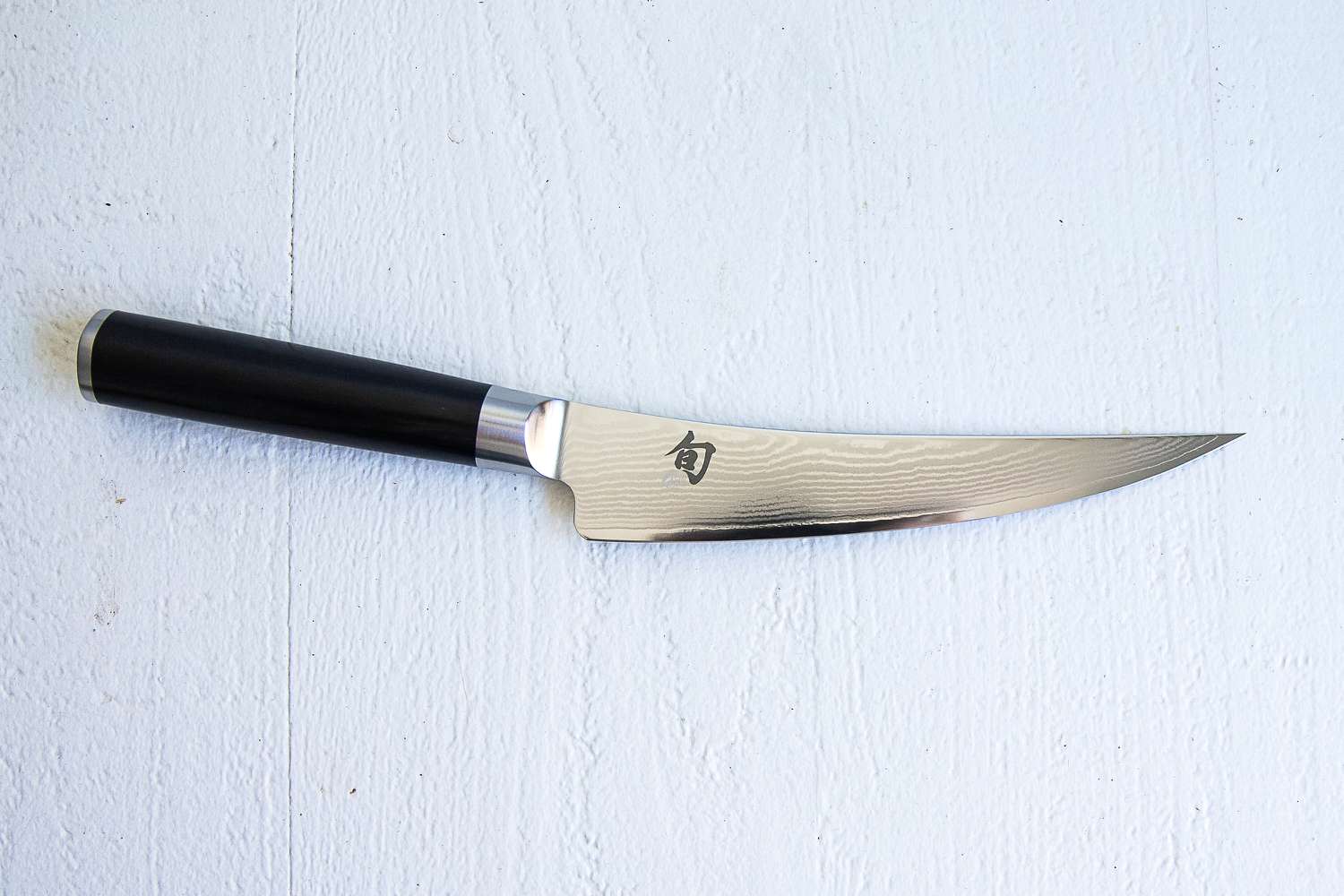 Shun Classic 6" Boning & Fillet Knife on a white surface