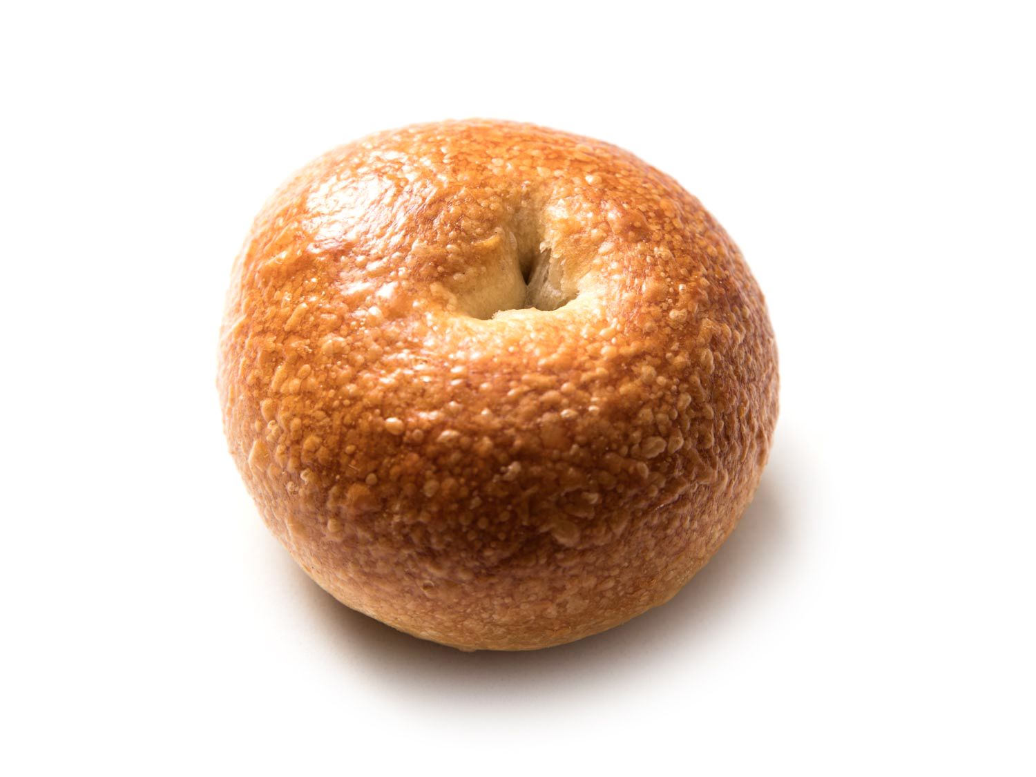 A bagel with a "belly button," lacking a hole in the center.