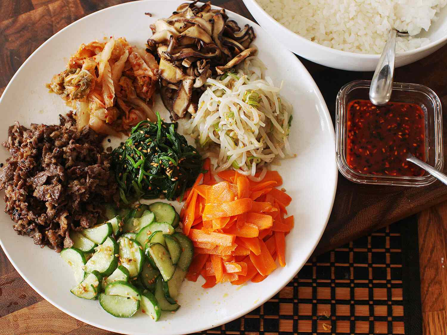Plate with prepped toppings for bibimbap