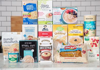 A selection of various instant oatmeal brands displayed on a counter