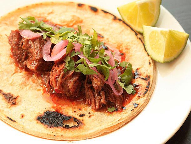 Juicy barbacoa taco topped with cilantro