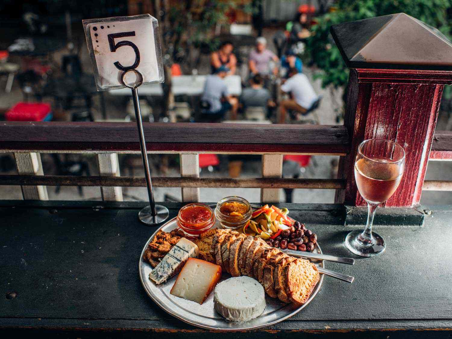 The cheeseboard at Bacchanal, with a glass of wine.