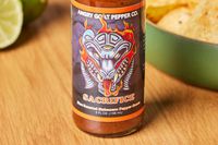 Close up of Angry Goat's Sacrifice Fire-Roasted Habanero Sauce