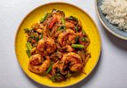 Shrimp Stir-Fry put on a yellow plate 