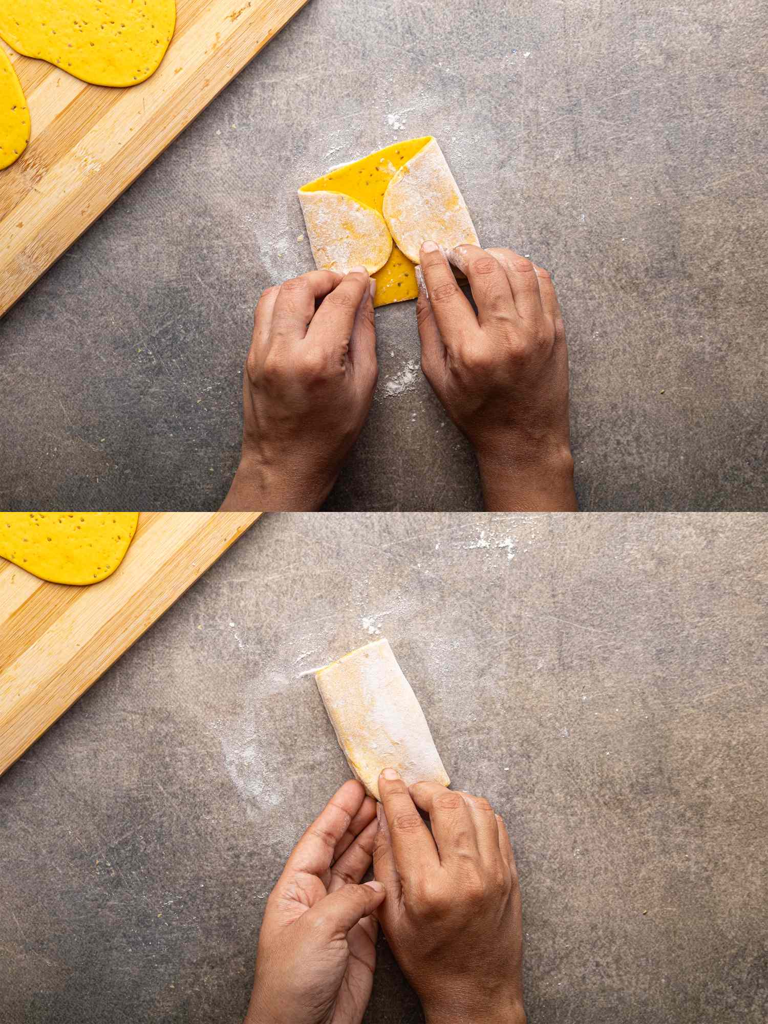 Hands folding dough to make a pocket or shape demonstrating a cooking process