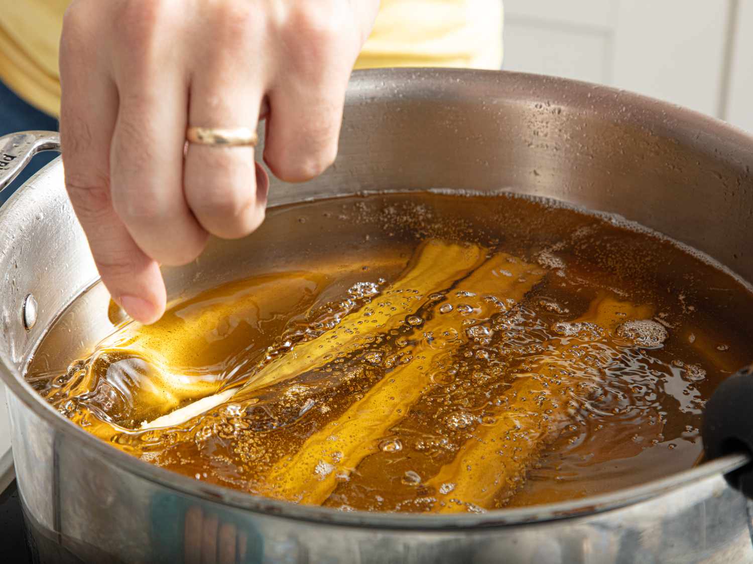 Overhead of churros frying