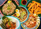 Photo Illustration of 5 Filipino dishes, overlapping and encircled by a colored ring with the dishes name on it