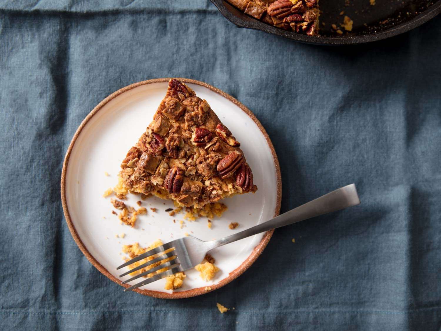 Overhead shot of a plated slice of pumpkin streusel coffee cake.