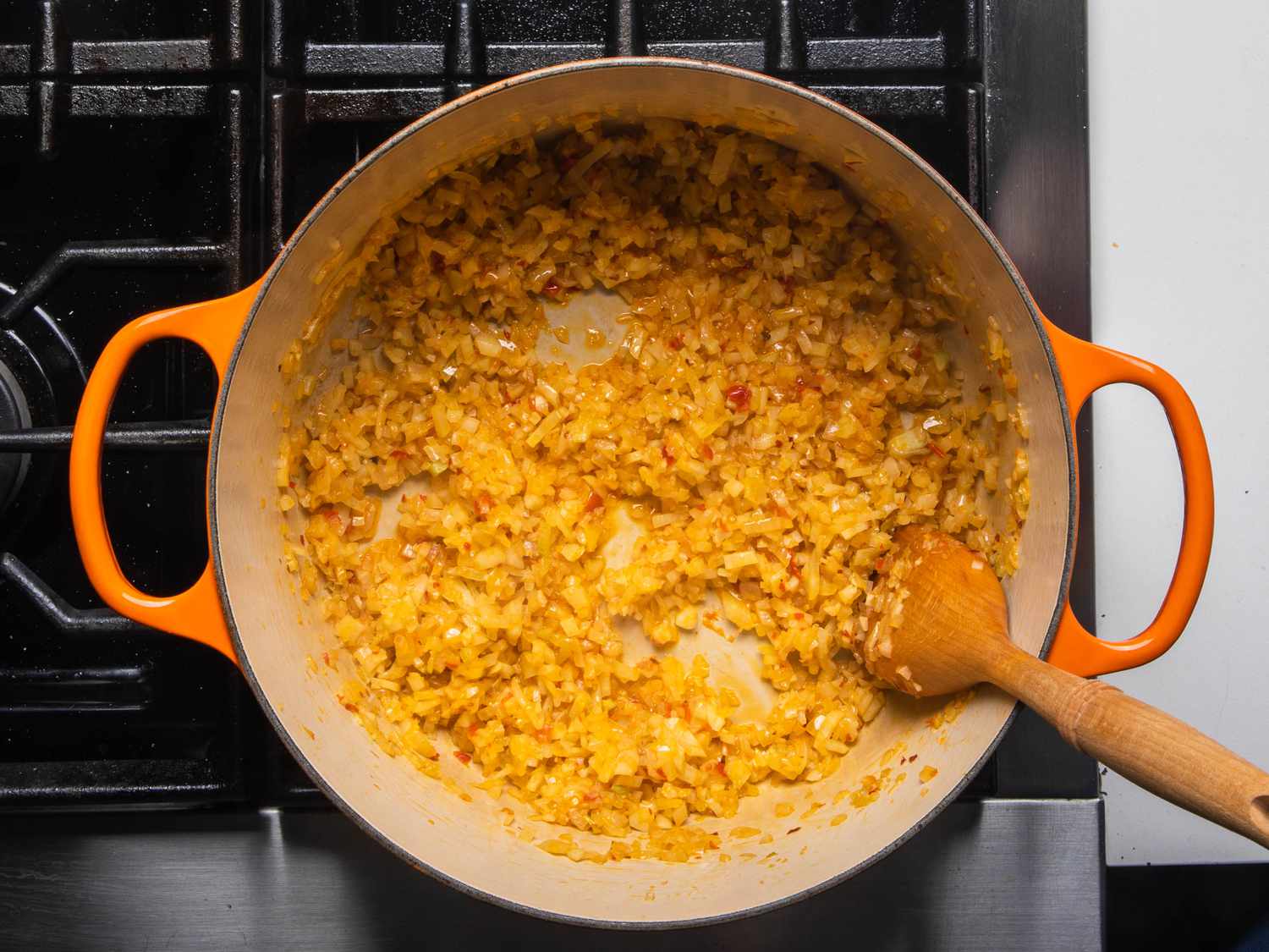 Sauteed onion and fennel with the chile paste in the pot.