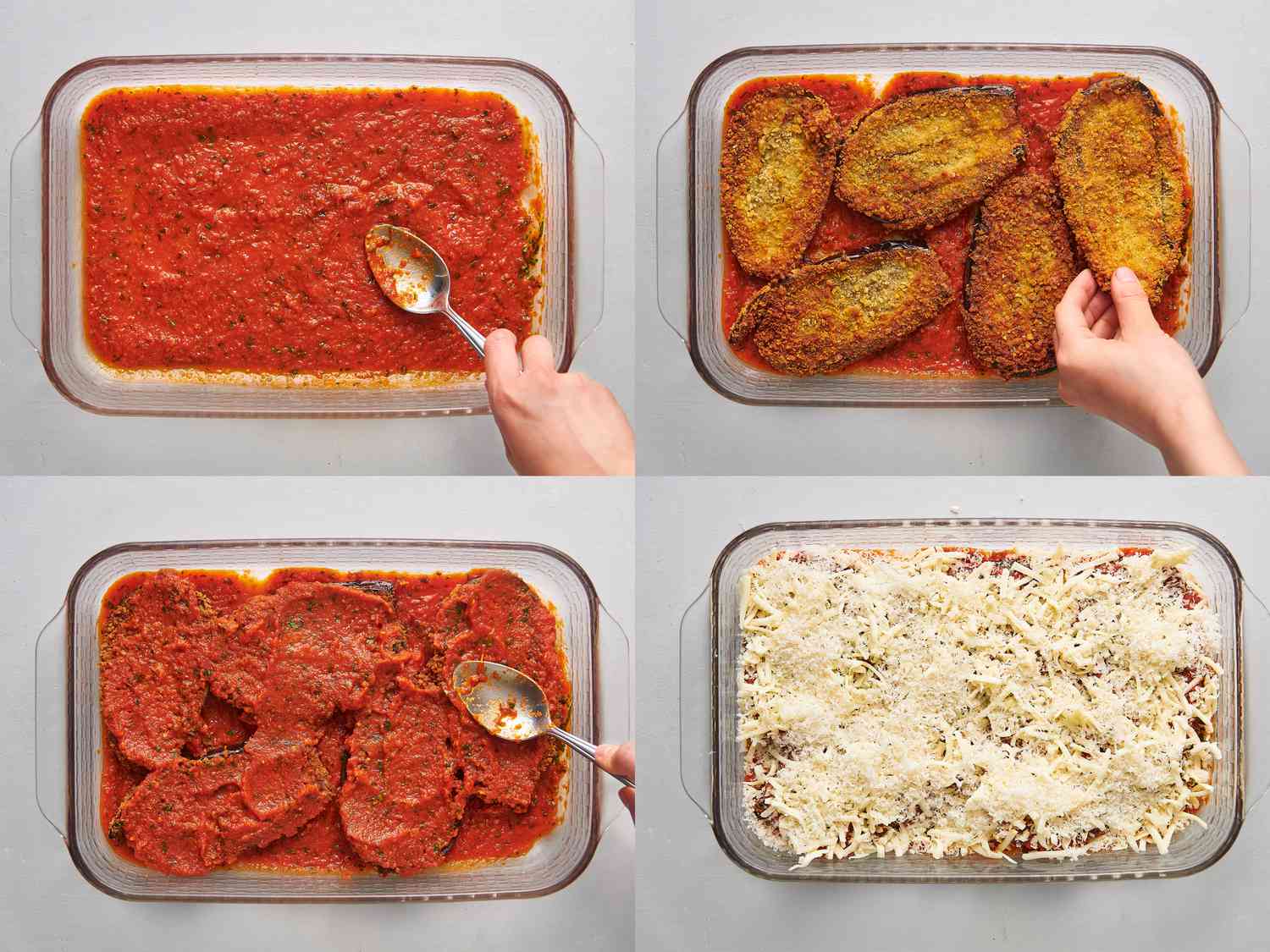 tomato sauce spread over glass baking dish with eggplant slices and mozzarella 