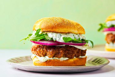 Plated lamb burger showing all its layers