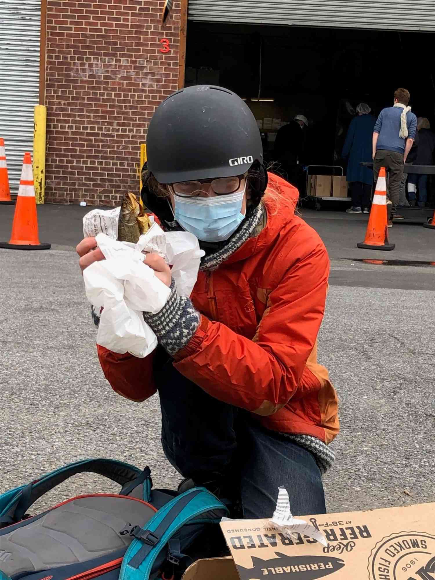 Daniel caressing his smoked fish haul
