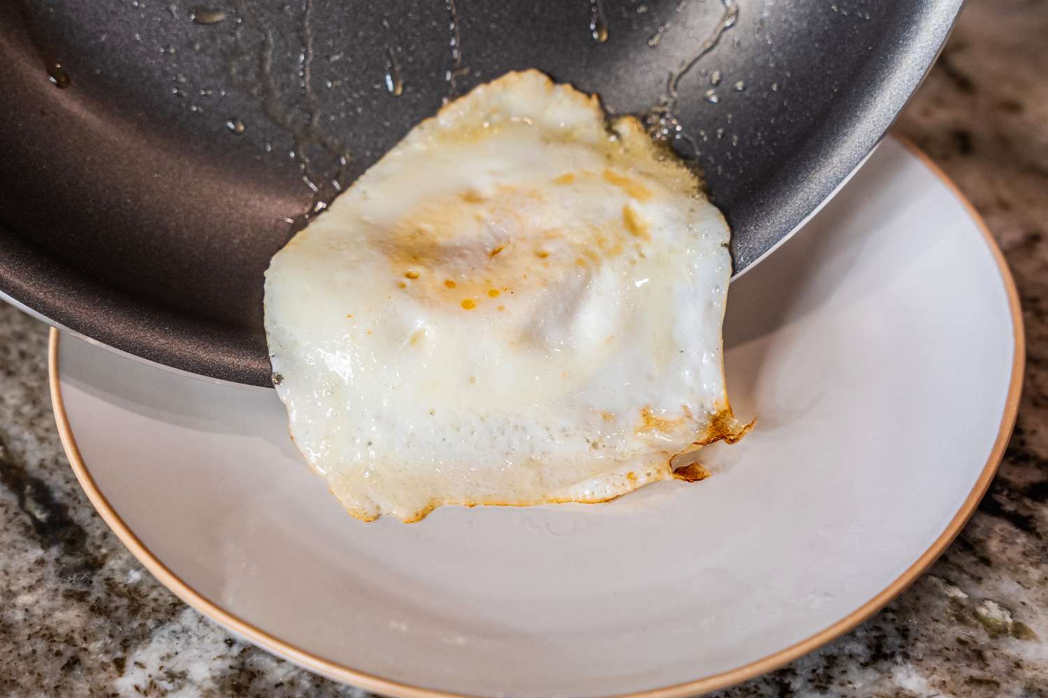 A egg cooked in the Tramontina 10-Inch Professional Aluminum Nonstick Restaurant Fry Pan