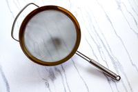 Rösle Stainless Steel Round Handle Kitchen Strainer on a marbled surface