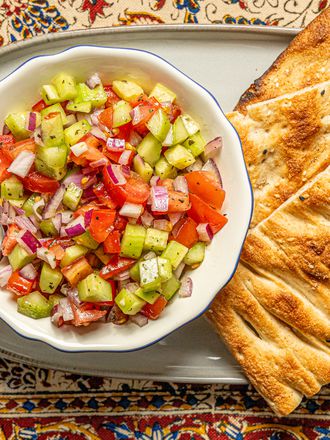 Overhead view of Shirazi salad with bread