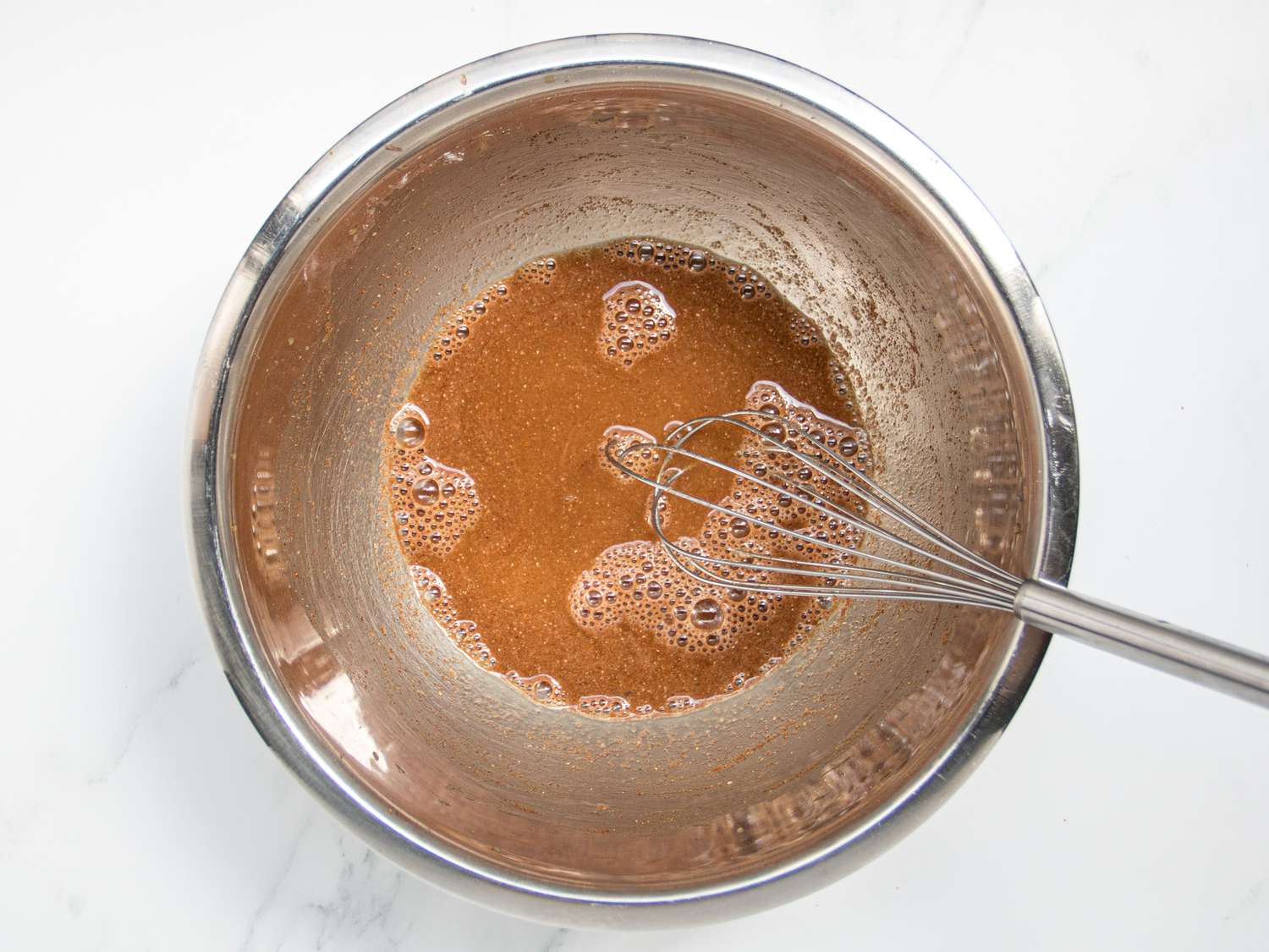 Cider, brown sugar, lemon juice, cornstarch, nutmeg,all spice and salt whisked together in a metal bowl 