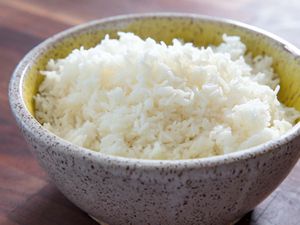 A bowl of fluffy rice, cooked in the microwave.