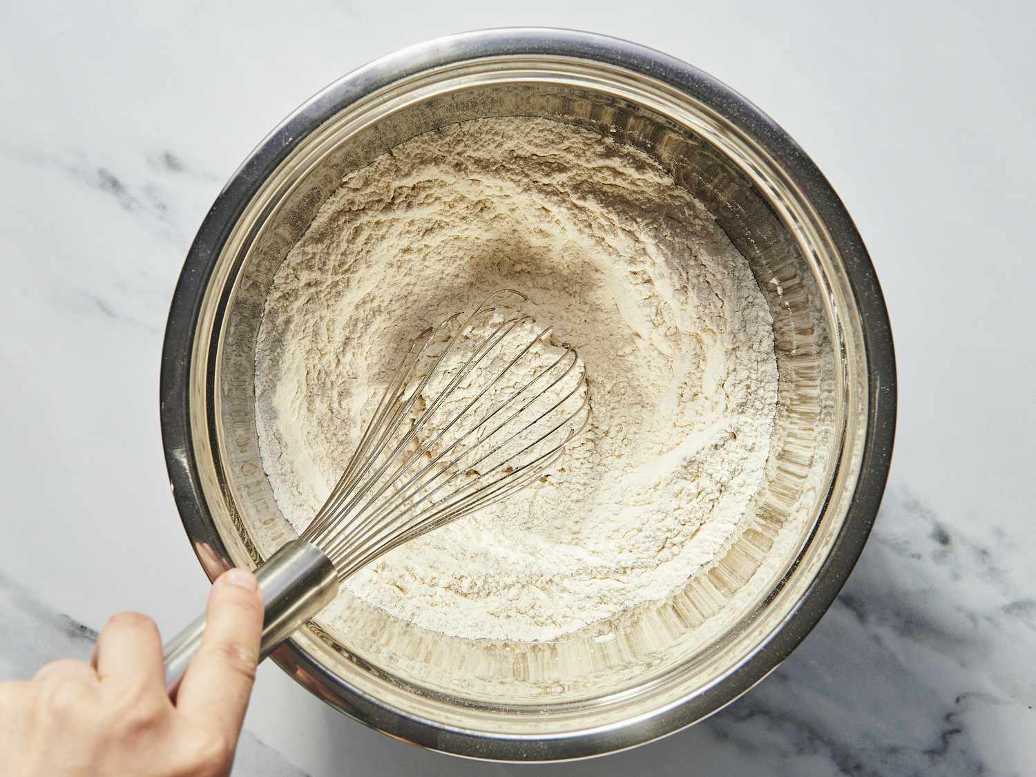 Overhead view of mixing dry ingredients