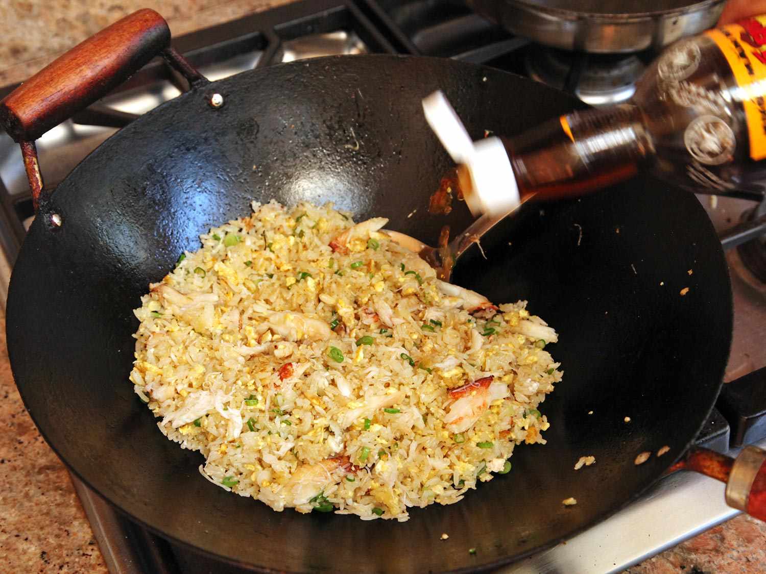 Fish sauce is added to the pan.