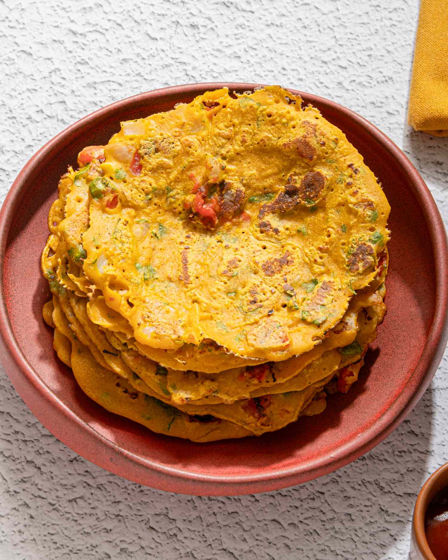 A stack of Indian flatbreads on a plate